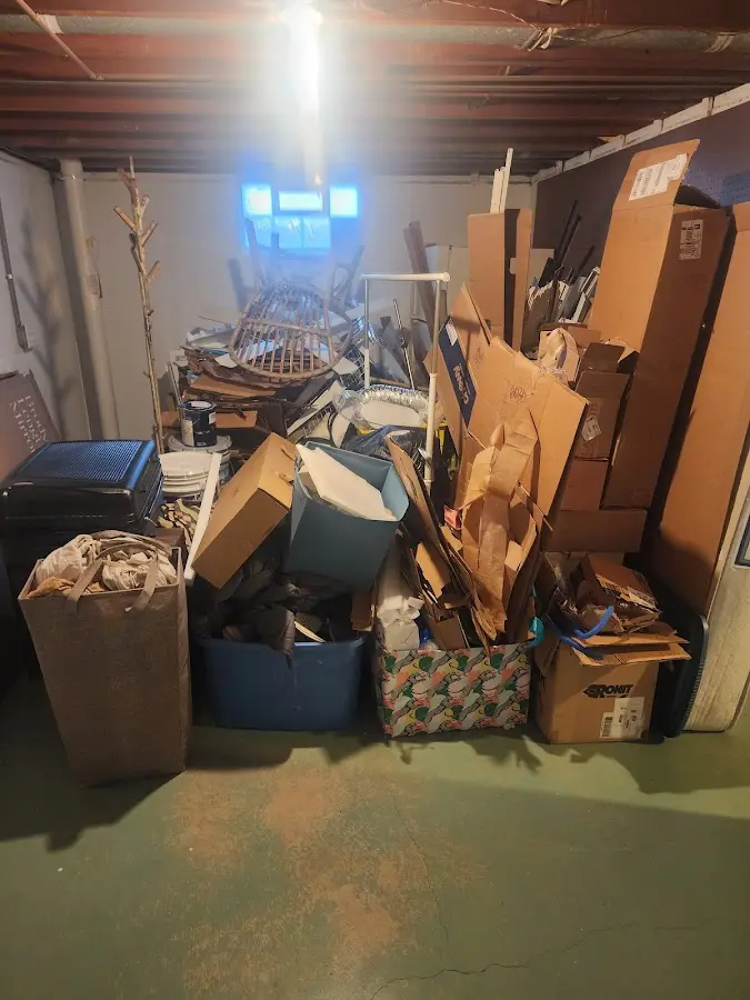 Roll-off dumpster container at job site for 2 Yard Dumpster Rental in Leonardtown